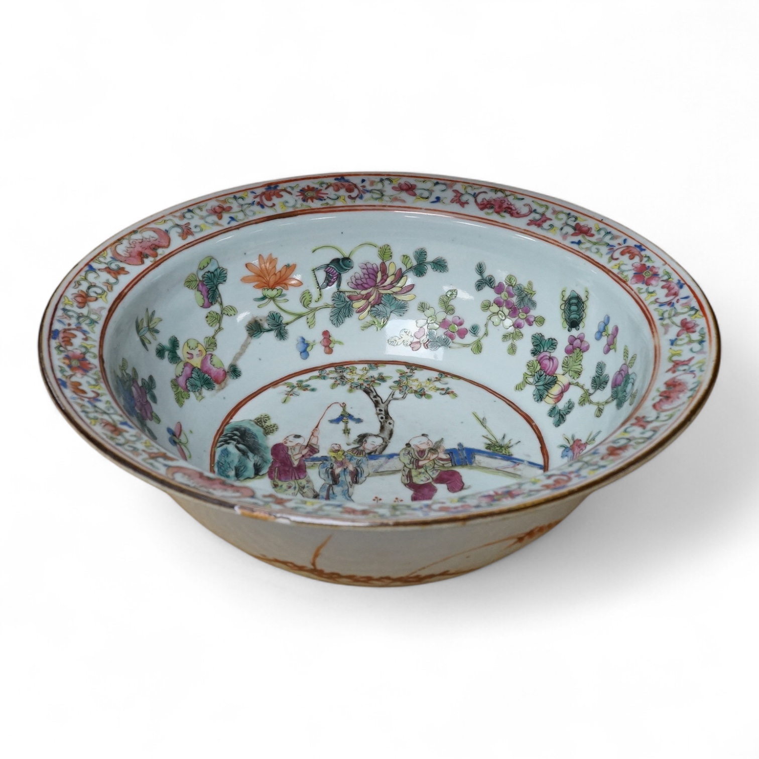 A 19th century Chinese famille rose basin, with wax seal to base., 30cm diameter x 10cm high. Condition - some wear to decoration.